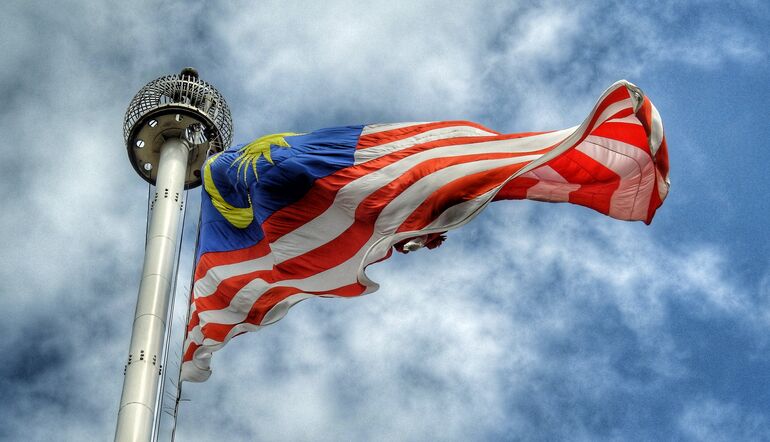 Malaysian flag on a flag pole - Cookiebot