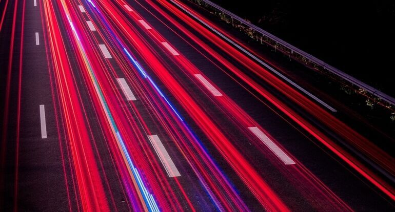 Long exposure of traffic on a road at night - Cookiebot