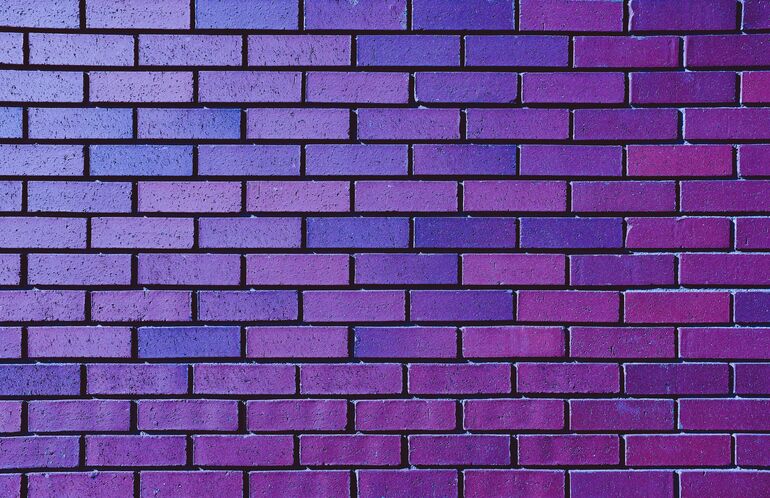 Purple brick wall - Cookiebot