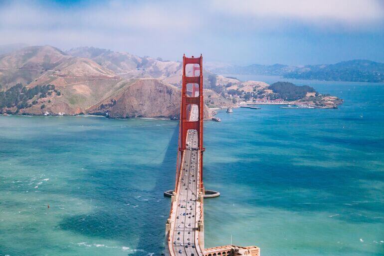 Golden Gate Bridge with mountains in the background - Cookiebot